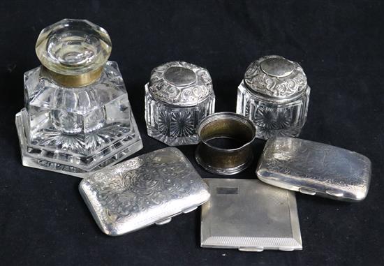 Three silver cigarette boxes, two jars, an inkwell and a napkin ring